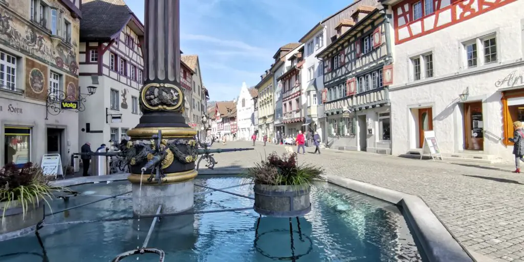 The middle age town of Stein am Rhein with a beautiful fountain.