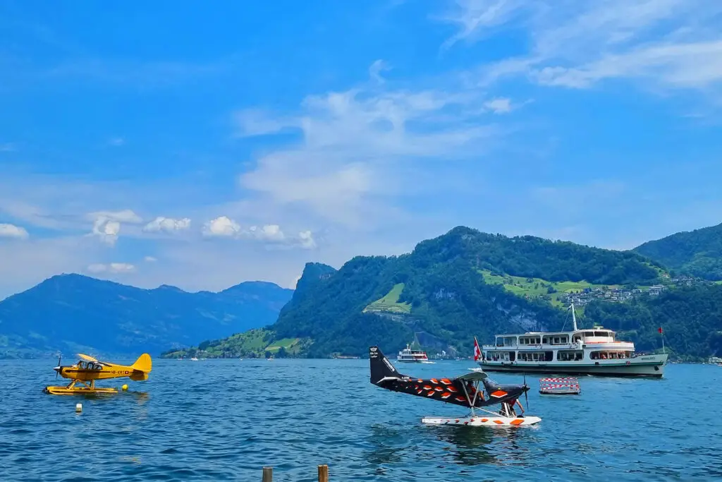 Hergiswil - a beautiful Swiss village at Lake Lucerne her with a ship and water planes.